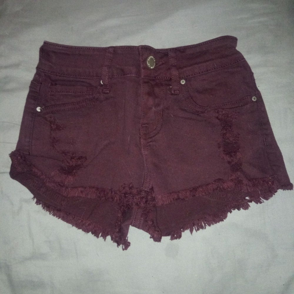 maroon shorts.